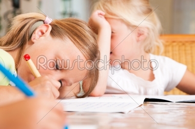 Children doing homework for school
