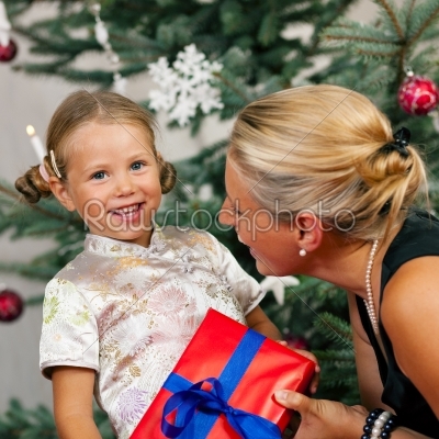 Christmas - child receiving a gift