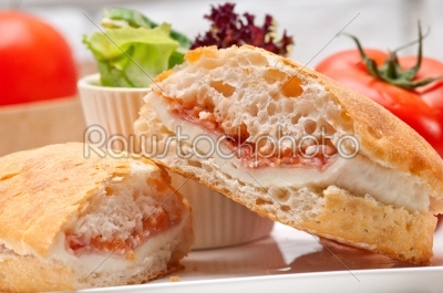 ciabatta panini sandwich with parma ham and tomato