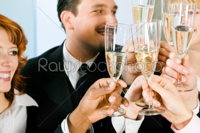 Clinking champagne glasses