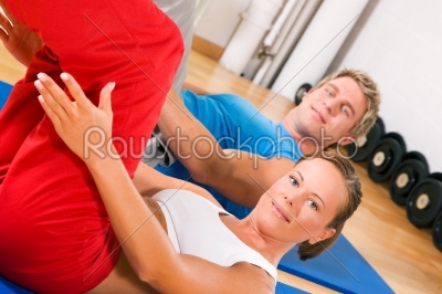 Couple doing Sit-ups