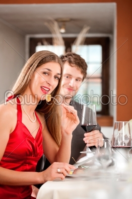 Couple Having Food at Restaurant