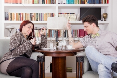 couple sitting in chairs in the living room