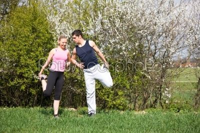 Couple Stretching for sport outdoors