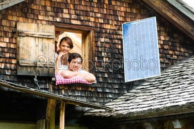 couple with bed clothes in mountain cabin