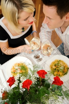 Couple with pasta and wine