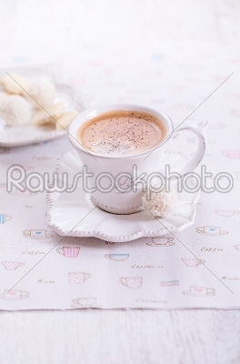 Cup of coffee with  sweets