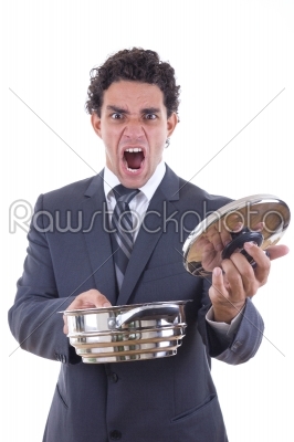 dissatisfied man holding pot for cooking with expression