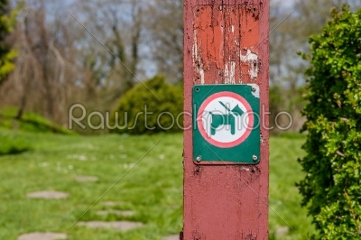 Dog in leash sign
