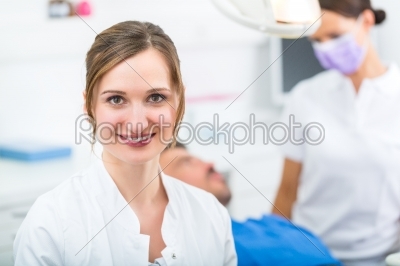 experienced female Dentist in her surgery