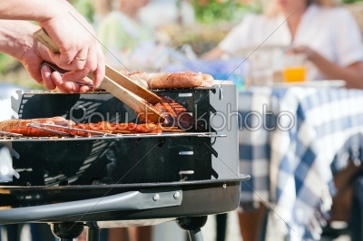 Family having a barbecue