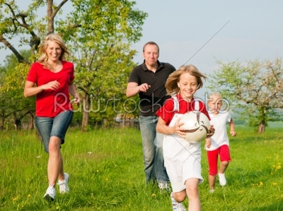 Family playing ballgames