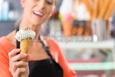 Female seller in Parlor with ice cream cone