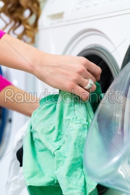 Female student in a laundry