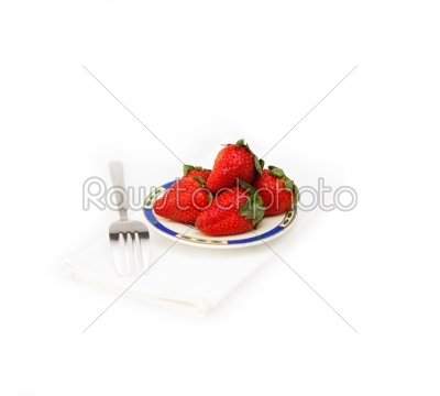 fresh strawberries dish over white