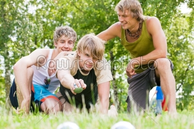 Friends playing boule