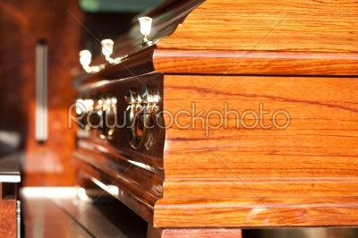 Funeral with coffin in hearse