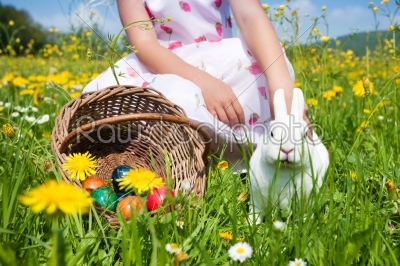 girl sitting with easter bunny