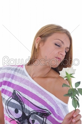 girl smelling a rose