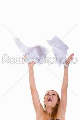 girl throwing papers in the air