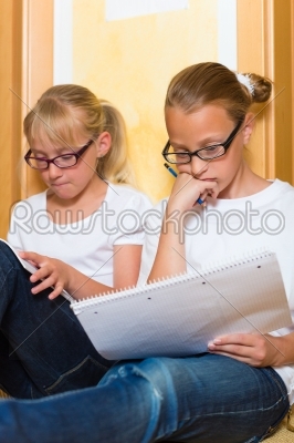 Girls doing homework for school