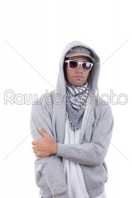 good looking cool gangster in sweatshirt with hood wearing sungl