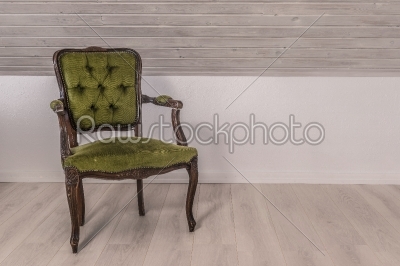 Green chair in victorian design
