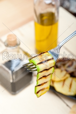 grilled zucchini courgette on a fork