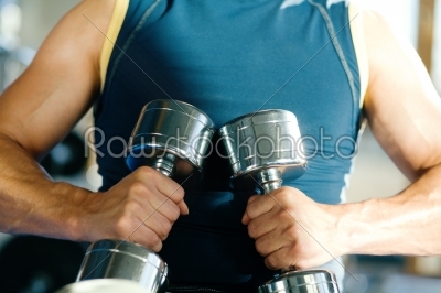Guy with dumbbells