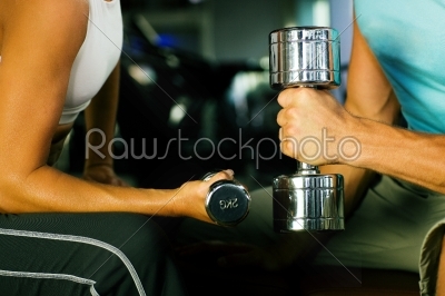 Gym workout with dumbbells