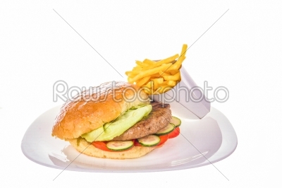 hamburger with salad and french fries isolated on white plate