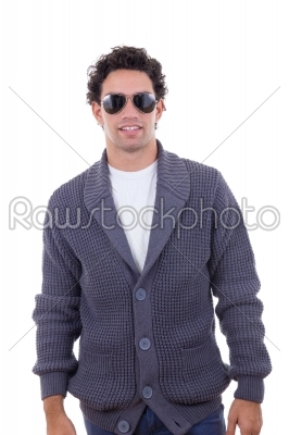 handsome fashion man in sweater wearing sunglasses