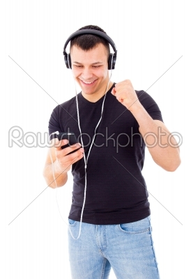 handsome guy succeeds to run playlist on mobile phone
