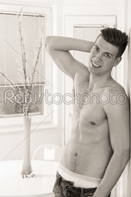 handsome guy with naked chest in jeans and underwear