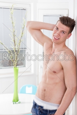 hot sexy guy with naked chest posing with arm lifted