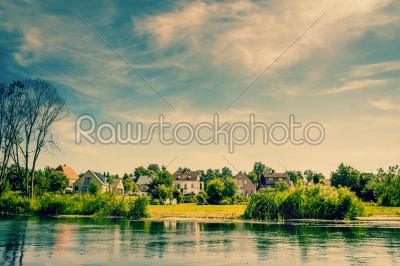 Houses by a river stream