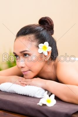 Indonesian woman in wellness day spa