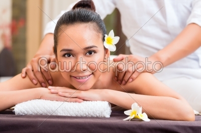 Indonesian woman wellness massage in spa