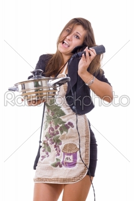 inexperienced female cook trying to be housewife talking on the 