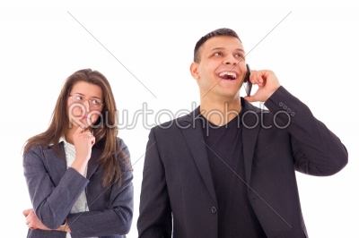 jealous woman looking at her man talking on the phone