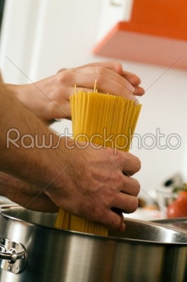 Man cooking pasta
