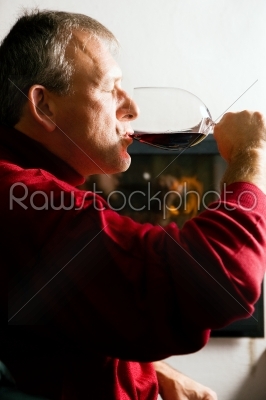 Man drinking red wine