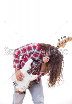 man in shirt with tousled hair playing electric bass guitar