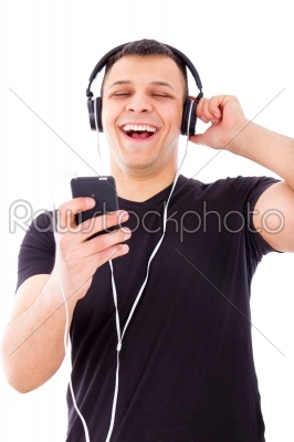 man laughing watching and listening radio show on mobile phone