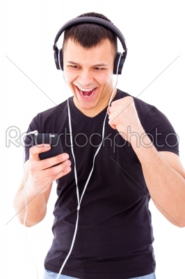 man listening playlist on mobile phone wearing headphones