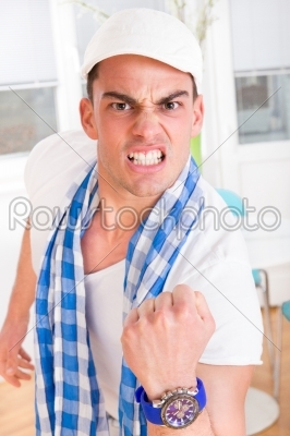 man showing with his hand sign of serious success
