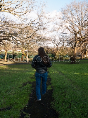 Man Walking a Rural Path
