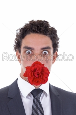 man with a rose in his mouth