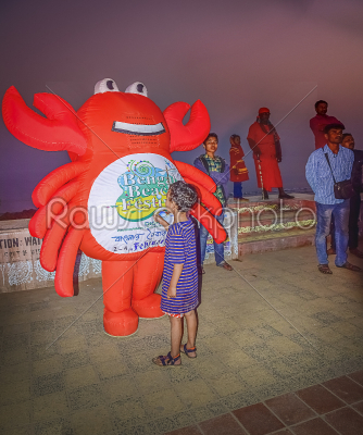 Mascot of crab like structure on the beach festival of some seas