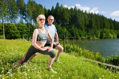 Mature couple doing sport outdoors
